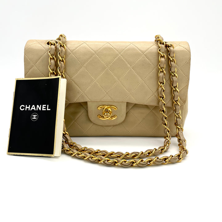 CHANEL Matelasse shoulder bag with double flap